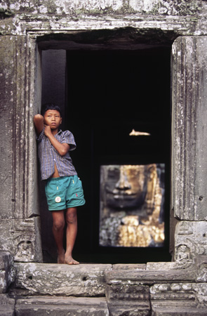 Boy at the Bayon Temple Angkor Thom Cambodia 1